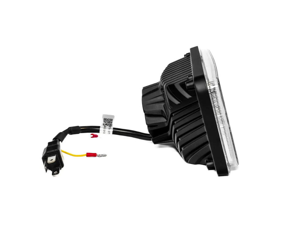 Car headlight assembly with wiring on a white background
